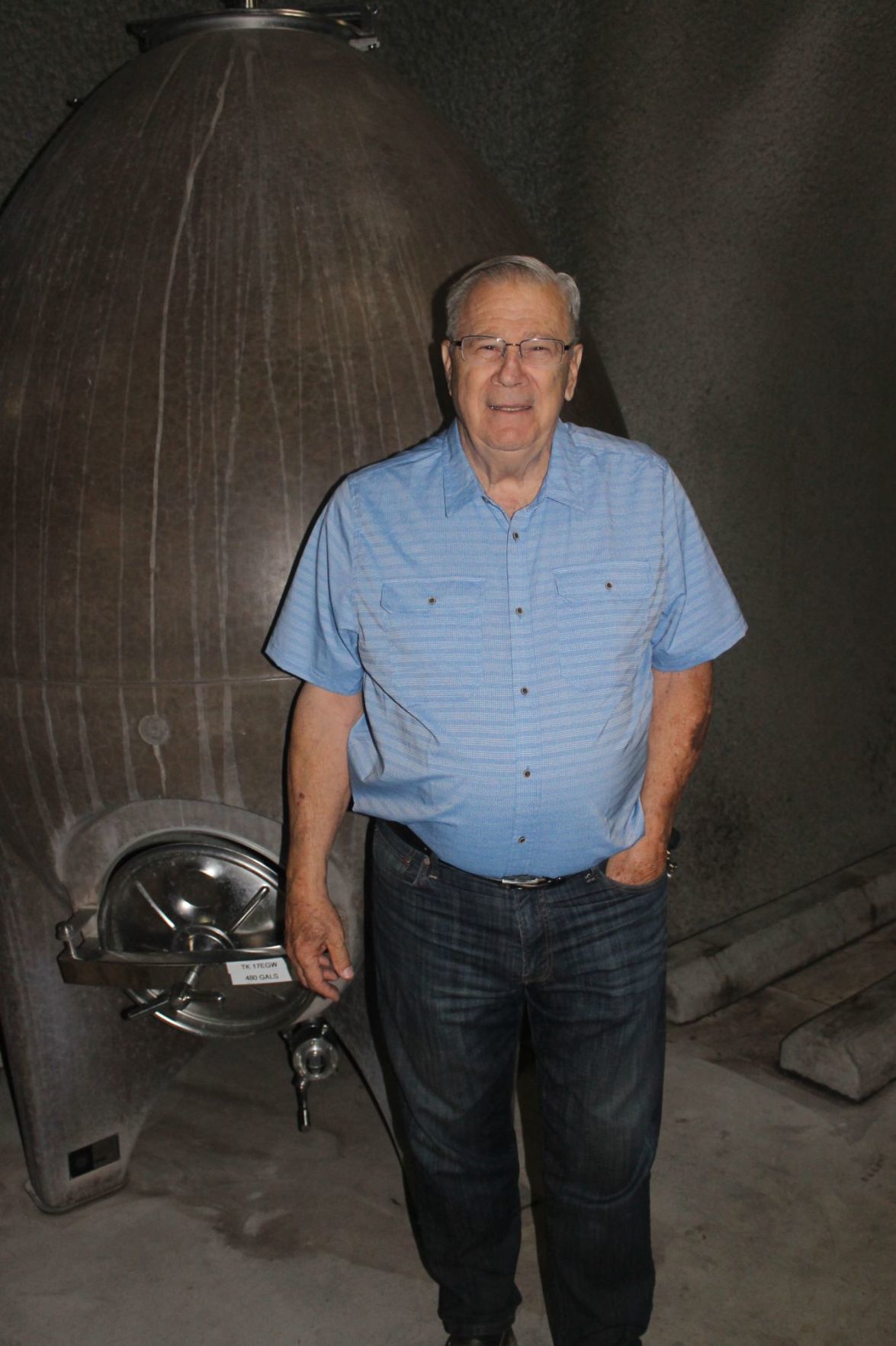 John Komes and concrete fermenter tank